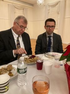 Afterwards the board and honored guests enjoyed a Wigilia meal at the Glen Cove Polish Hall. Yes that is seconds being consumed by Rick. Someone has to take on the challenge for Polish honor. Mateusz wasn’t up to the challenge, note the empty plate...