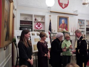  Museum volunteers recognized at event, here receiving corsages from Director Kochan